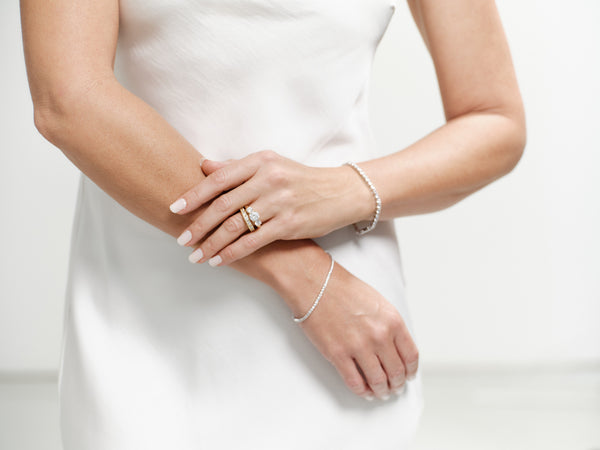 Sophia -Gold eternity band alternating pattern of round brilliant-cut and baguette-cut