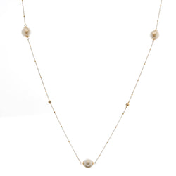 Long pearl and cubic zirconia necklace