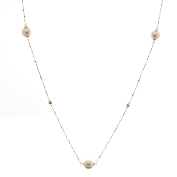 Long pearl and cubic zirconia necklace